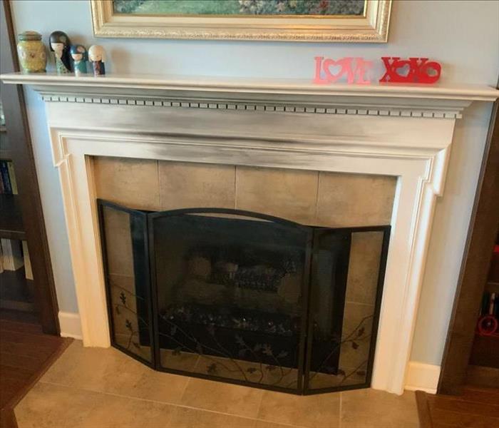 Before SERVPRO of greater St. Augustine fire damage restoration services cleaned soot and smoke damage from this fire place