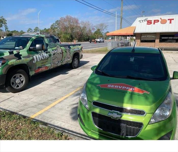 SERVPRO and Partner company vehicle's advertising together