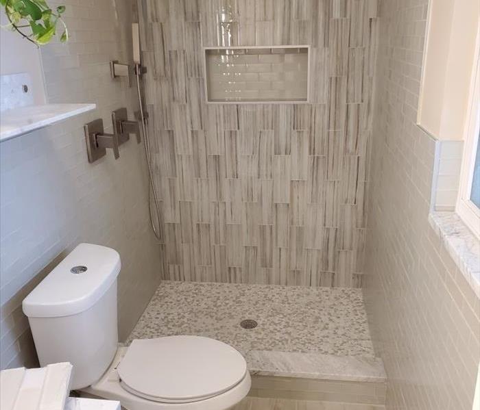 Before and After SERVPRO bathroom remodel