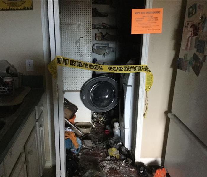 Laundry room that suffered from fire damage