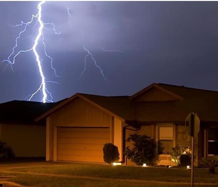 Florida home in the middle of a severe storm with lighting 